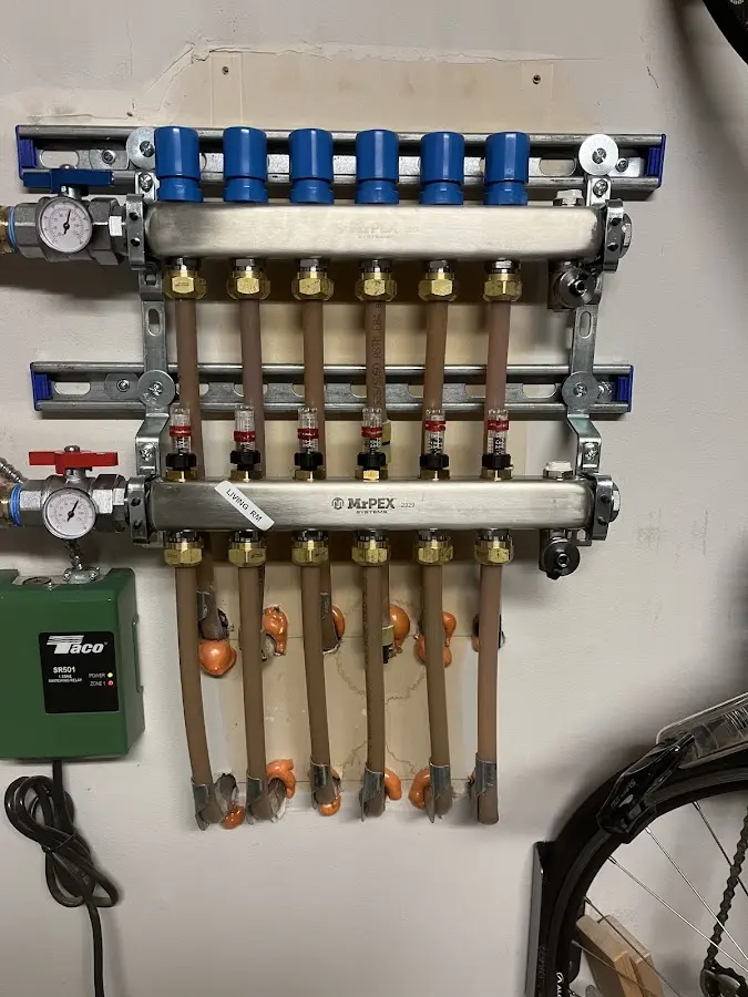 Plumber performing Gas Leak Detection at a residential property in Three Oaks